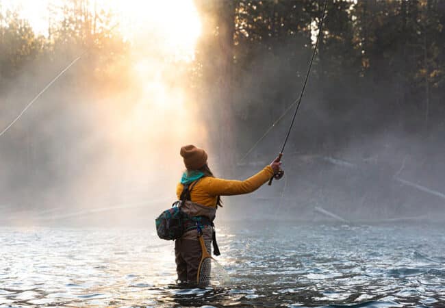 Fly fisher on the river in Bend, Oregon.