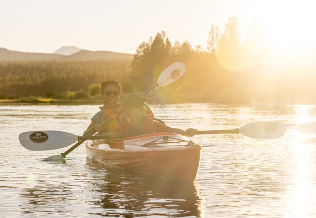 A family kayaking in Bend, Oregon