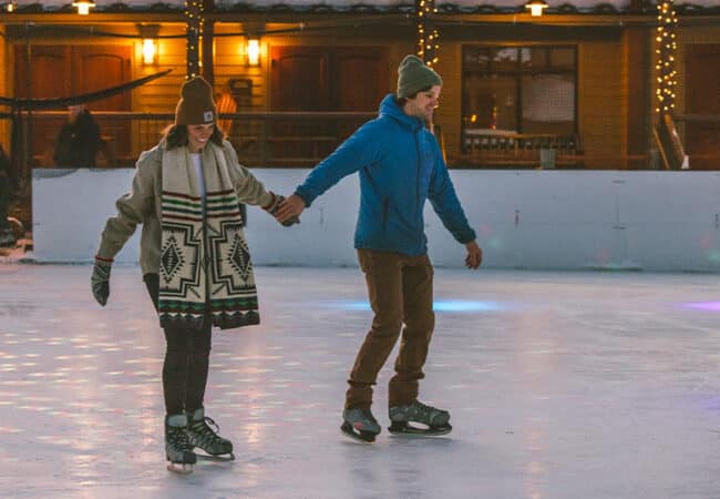 Couple Ice Skates in Bend, Oregon.