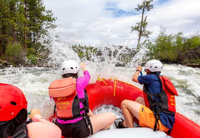 Group rafting on the river in Bend, Oregon.